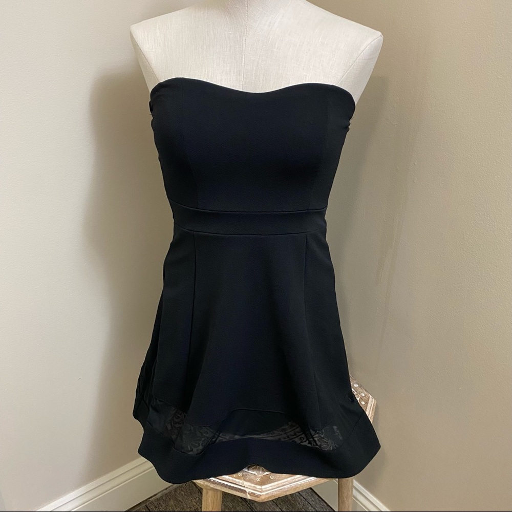 Black strapless dress.